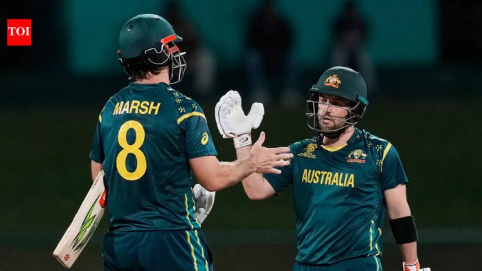 Australia-chase-target-10-overs-to-beat-Oman-by-9.jpg Australia chase target 10 overs to beat Oman by 9 wickets in final T20 World Cup group match | Cricket News