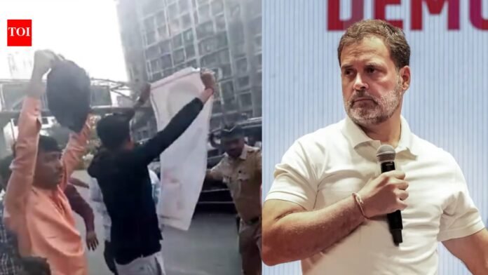 BJP-shows-black-flag-to-Rahul-Gandhi-after-Congress-topless.jpg BJP shows black flag to Rahul Gandhi after Congress topless protest at AI summit | India News