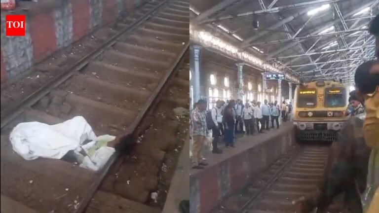 WATCH: Drunk man takes nap on track as train stops inches away | India News