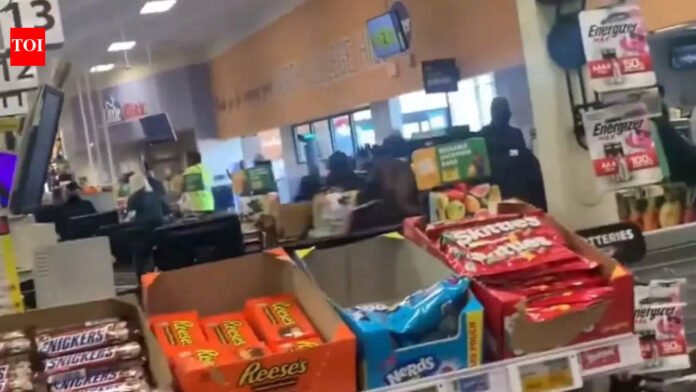 WATCH: Students storm Cincinnati Kroger store, throw cans, bottles during anti-ICE protest

