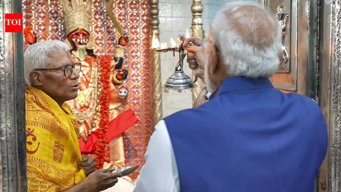 Modi prays at Kali temple to refute TMC's vegetarian policy


