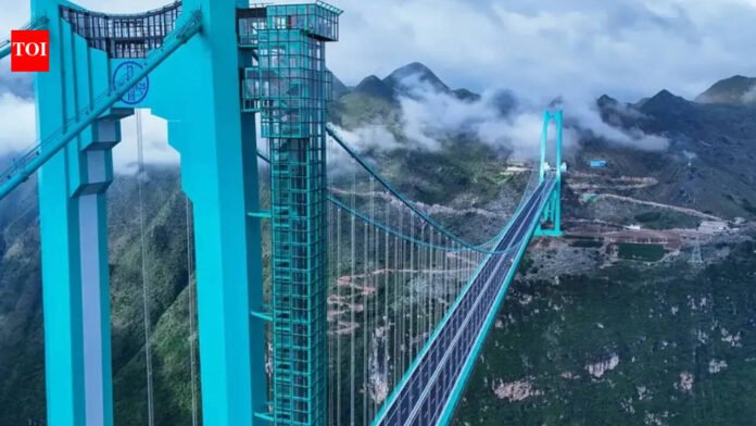 World's tallest Huajiang Grand Canyon Bridge cuts travel time from 2 hours to 2 minutes, joins 'Greatest Places of 2026' list | World News

