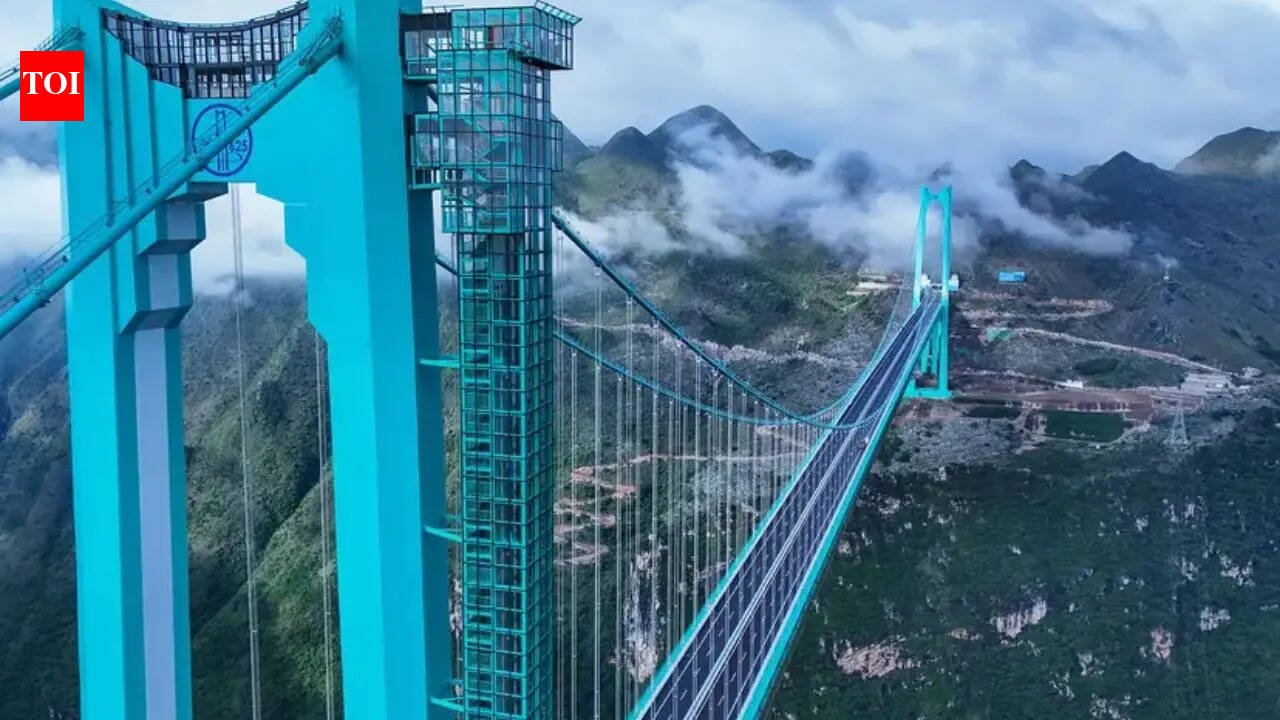 World's tallest Huajiang Grand Canyon Bridge cuts travel time from 2 hours to 2 minutes, joins 'Greatest Places of 2026' list | World News