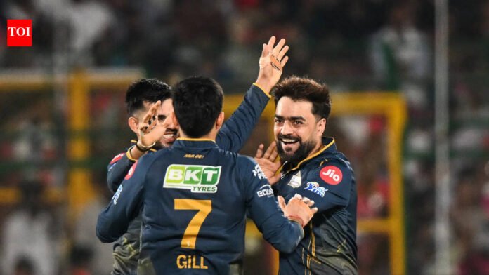 Rashid Khan and Shubman Gill power GT to a dominant win over RR by 77 runs

