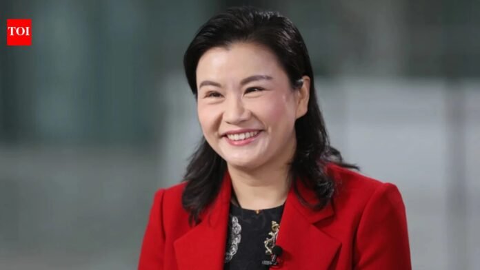 She once worked in a glass factory and now runs a $26 billion company and attends state dinners in China with Elon Musk and Tim Cook

