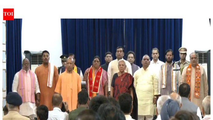UP cabinet expanded: Bhupendra Chaudhary, Manoj Pandey sworn in as ministers in Yogi government.

