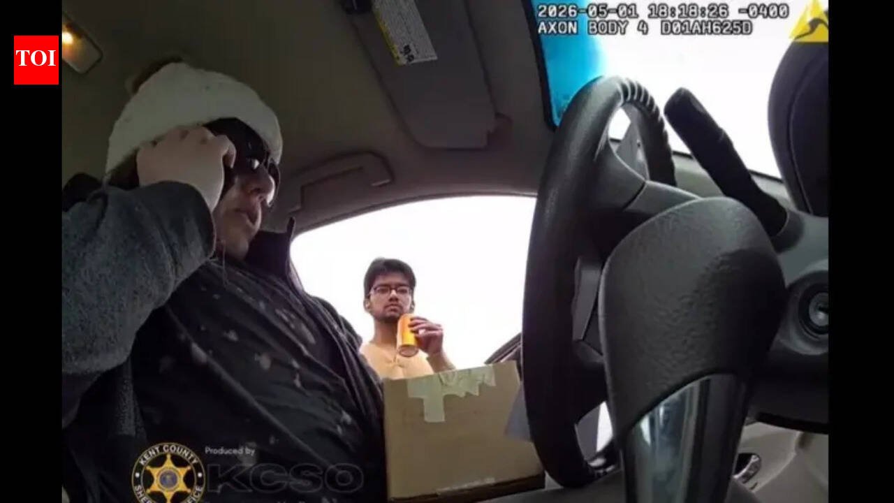 Dramatic video of Indian conman Yug B Chauhan drinking soda before being arrested by undercover agents in Michigan