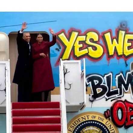 An altered graffiti photo of Obama and Air Force One