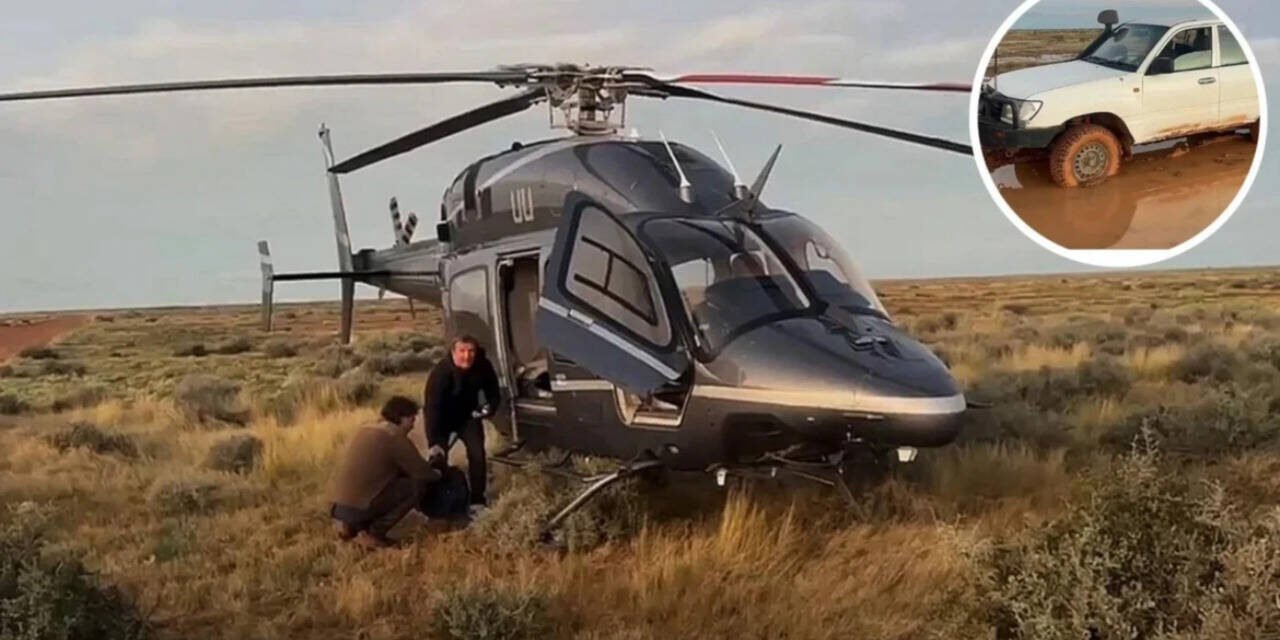 Australian father and son's car got stuck in a storm and they were stranded in the outback for 12 hours; billionaire Tim Roberts happened to save them in a helicopter