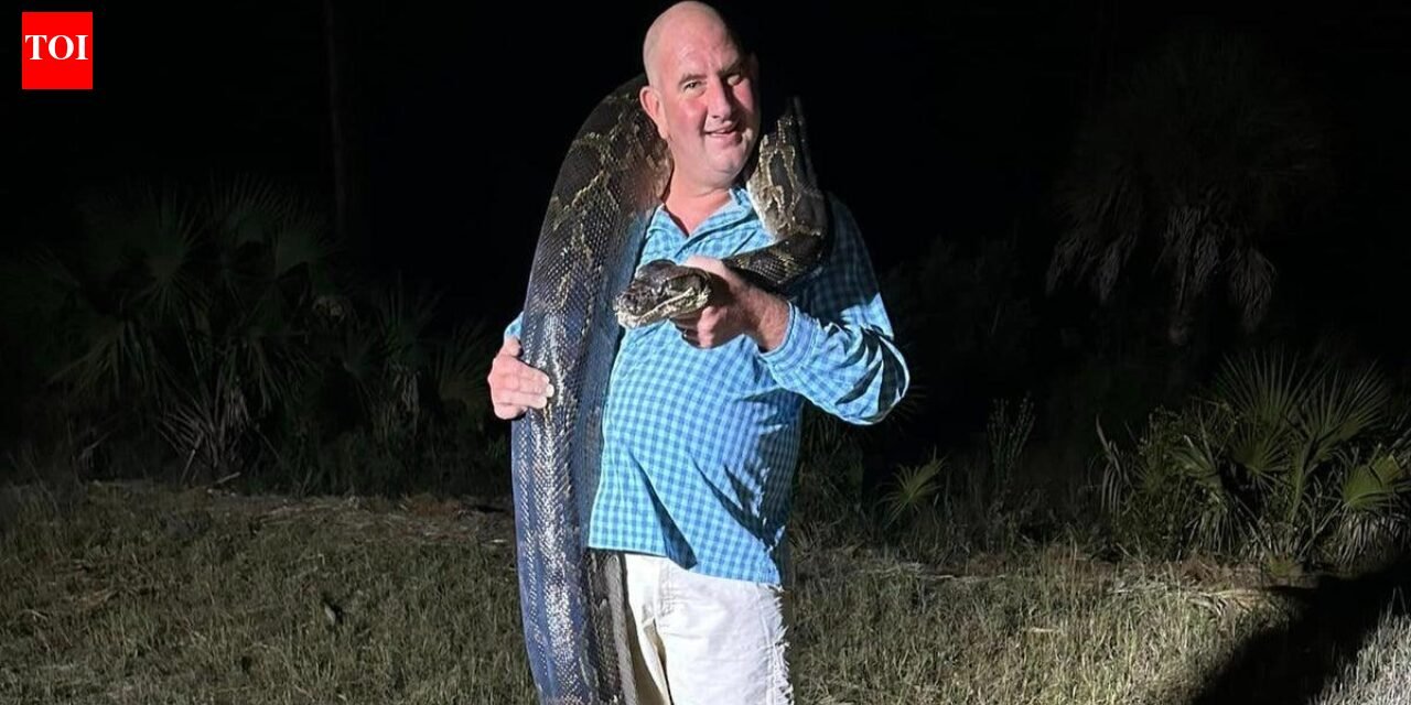 Florida dad caught a 202-pound Burmese python before it started dragging him toward a canal before his family was able to knock the giant snake down | World News