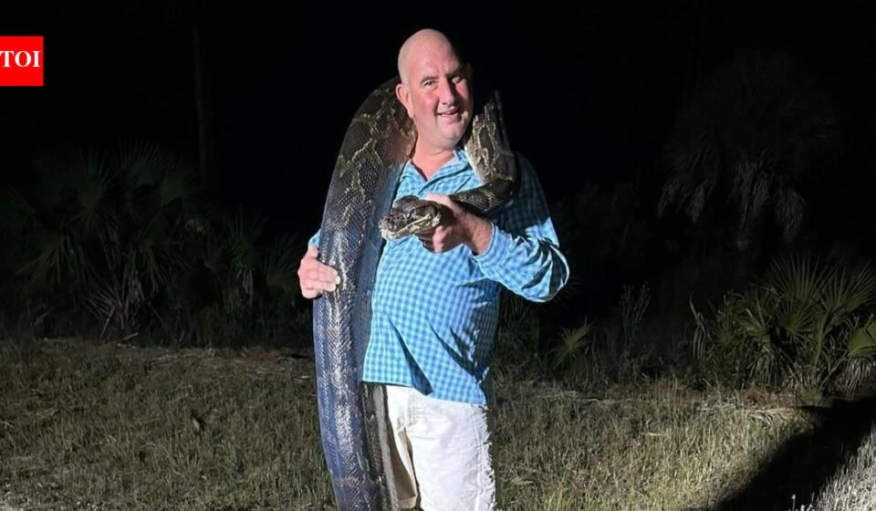 Florida dad caught a 202-pound Burmese python before it started dragging him toward a canal before his family was able to knock the giant snake down | World News