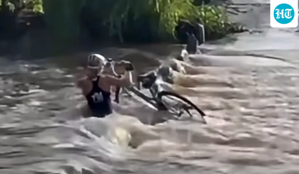 Female cyclist sucked underwater while trying to cross bridge; survives (KOLD NEWS)