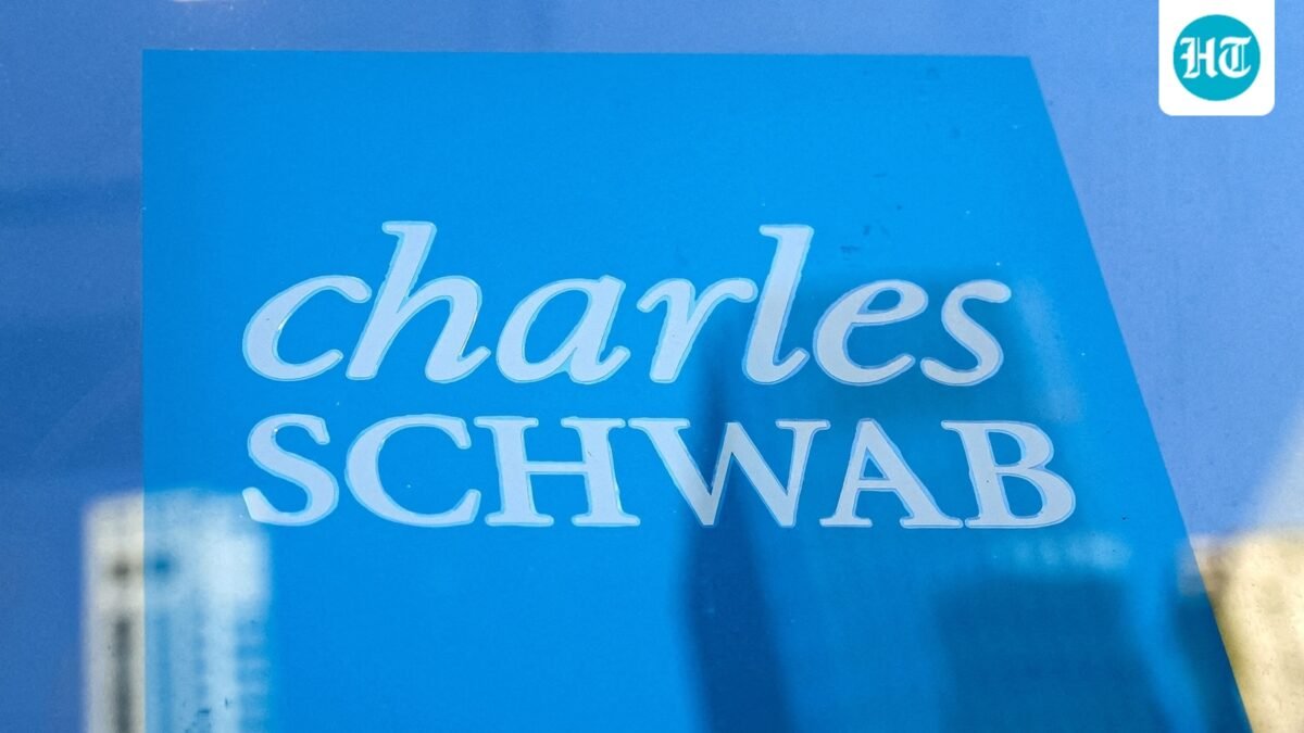 The company logo of Charles Schwab is displayed at a location in the financial district in New York. (REUTERS)