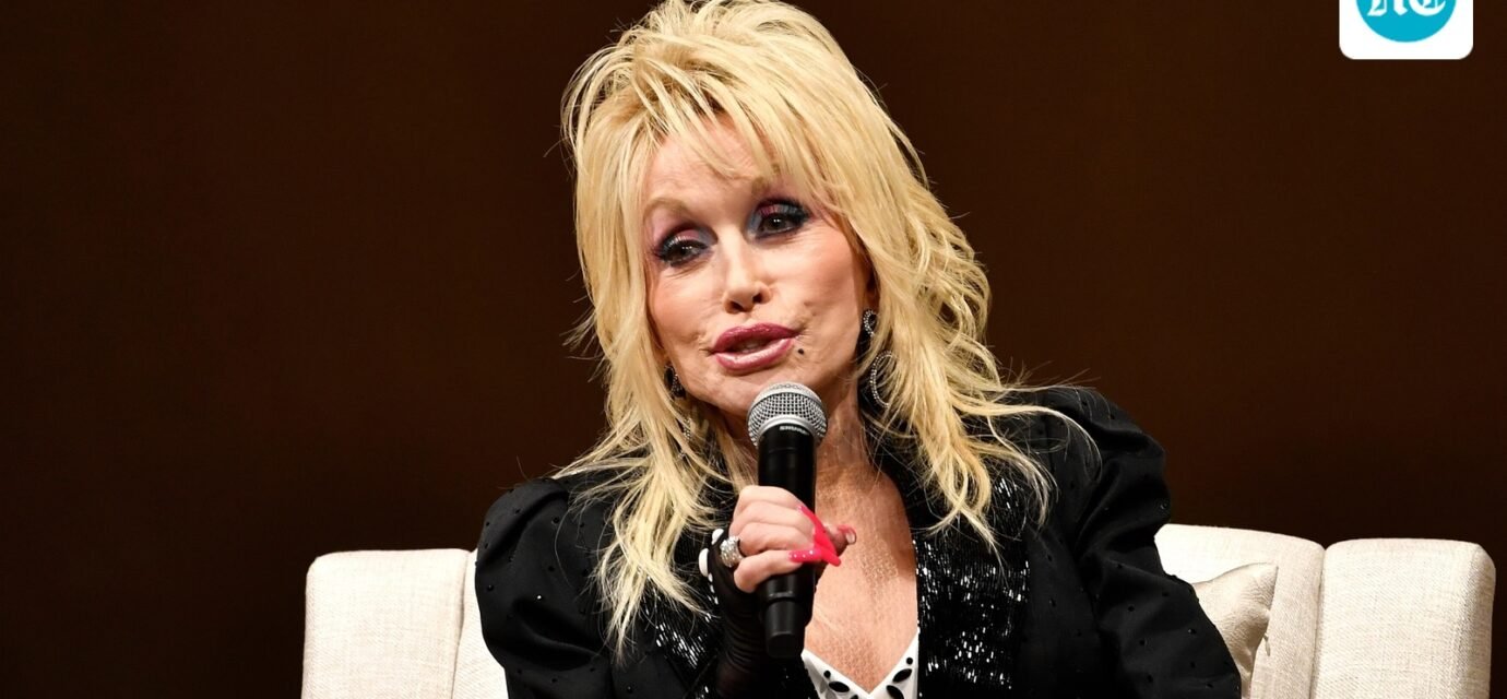Dolly Parton speaks to a audience gathered to celebrate the expansion of the Imagination Library of Kentucky at the Lyric Theatre in Lexington, Ky. (AP Photo/Timothy D. Easley)