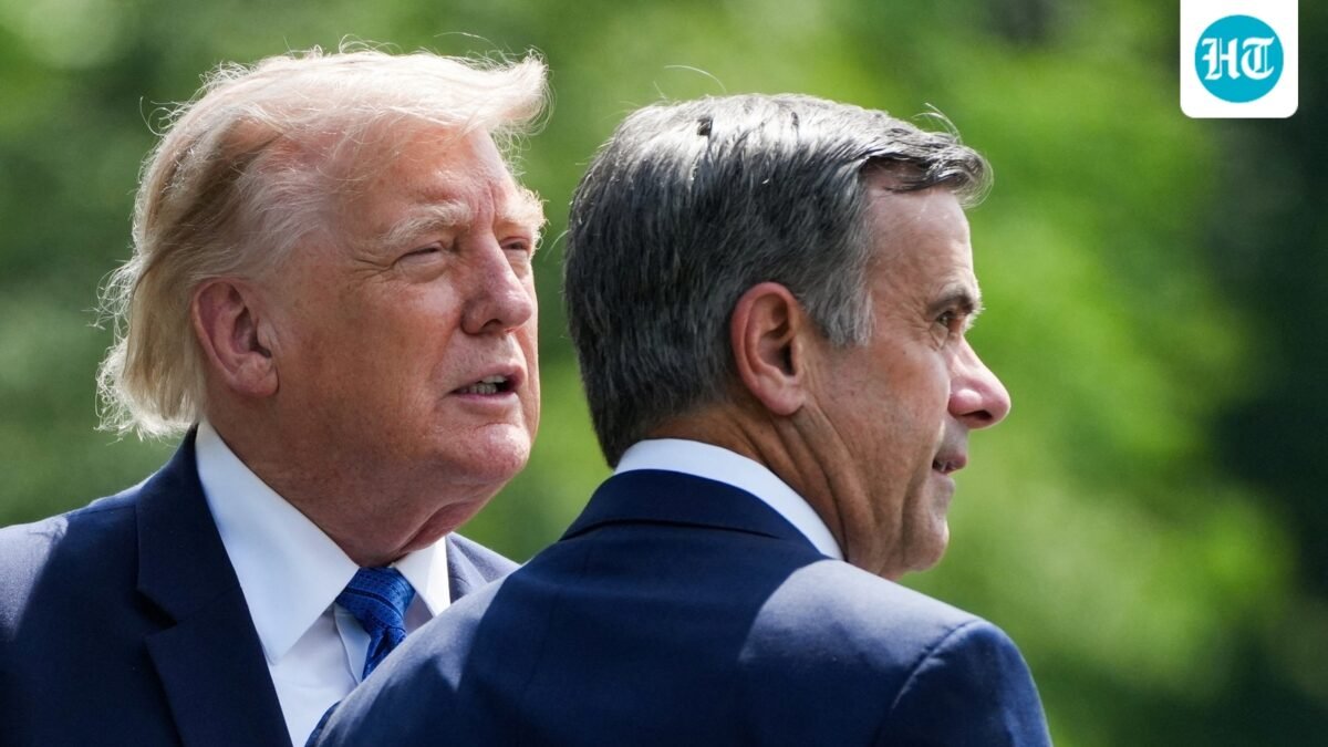 Donald Trump and John Ratcliffe, Director of the Central Intelligence Agency (CIA), speak as they depart after a Cabinet meeting at Camp David in Thurmont, Maryland on July 31. (REUTERS)