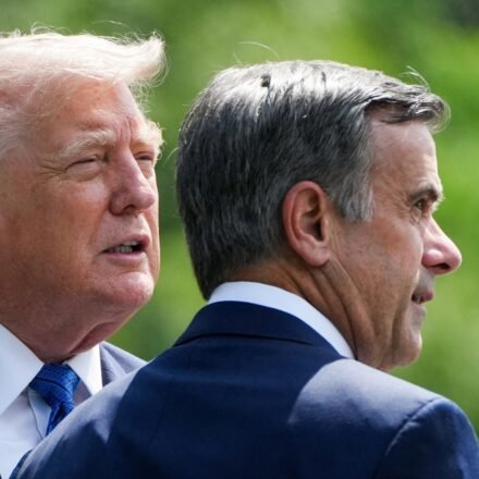 Donald Trump and John Ratcliffe, Director of the Central Intelligence Agency (CIA), speak as they depart after a Cabinet meeting at Camp David in Thurmont, Maryland on July 31. (REUTERS)