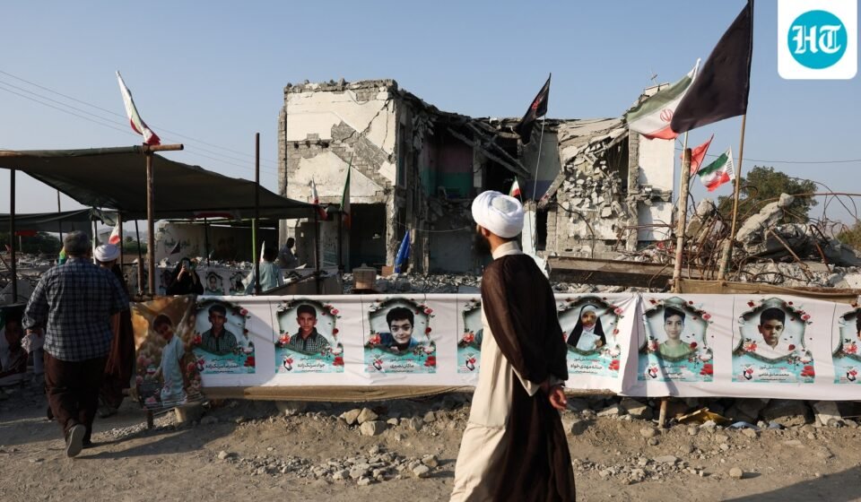 People visit Minab school, which was damaged in a strike on February 28, when US and Israel launched air attacks against Iran. (WANA via Reuters)