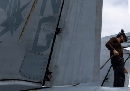 A U.S. sailor, assigned to Electronic Attack Squadron 133, washes an EA-18G Growler on the flight deck of the Nimitz-class aircraft carrier USS Abraham Lincoln during the ongoing conflict with Iran August 9, 2026.  U.S. Navy/Handout via REUTERS  THIS IMAGE HAS BEEN SUPPLIED BY A THIRD PARTY. (via REUTERS)