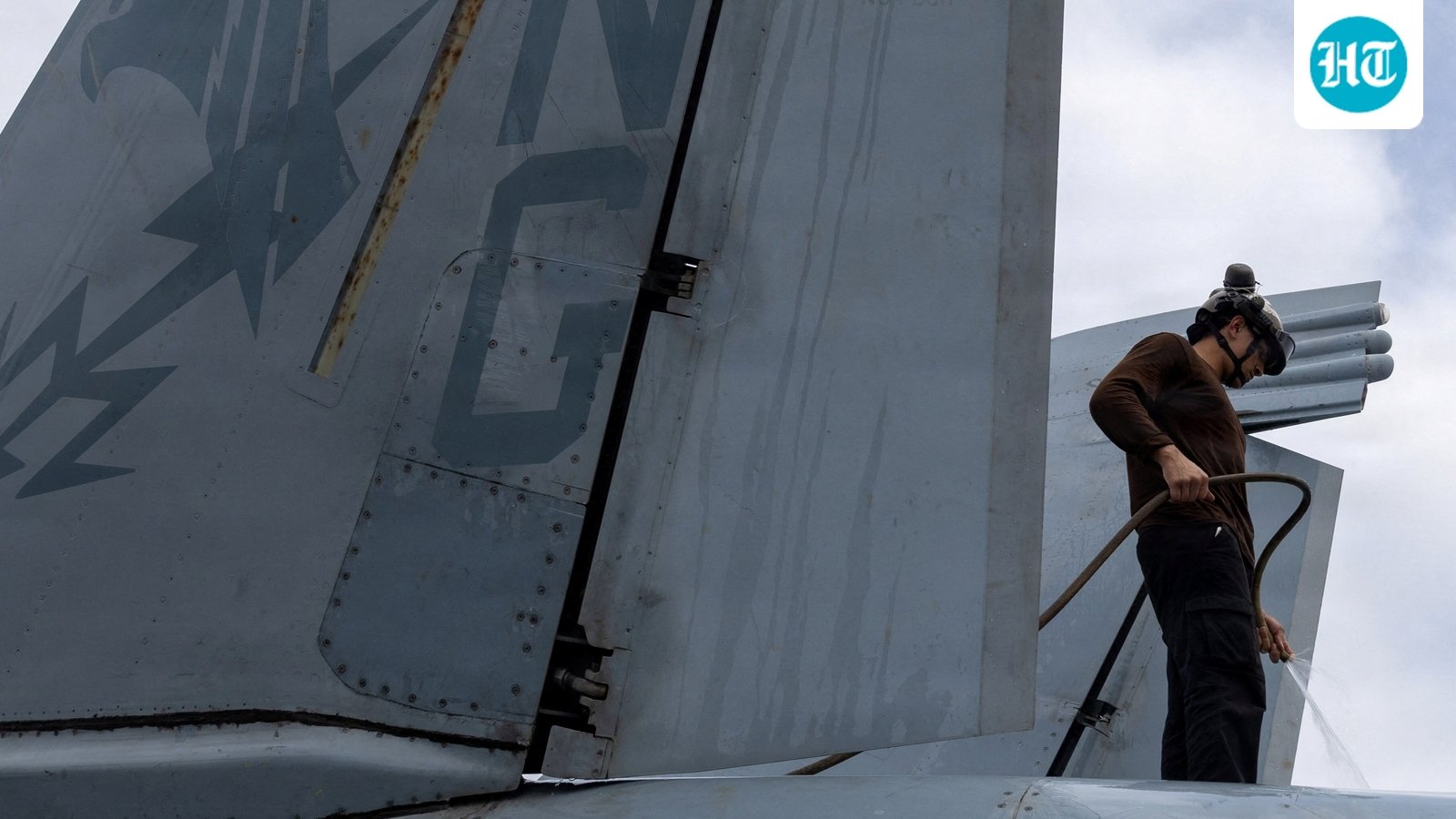 A U.S. sailor, assigned to Electronic Attack Squadron 133, washes an EA-18G Growler on the flight deck of the Nimitz-class aircraft carrier USS Abraham Lincoln during the ongoing conflict with Iran August 9, 2026.  U.S. Navy/Handout via REUTERS  THIS IMAGE HAS BEEN SUPPLIED BY A THIRD PARTY. (via REUTERS)