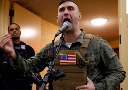 Far-right US activist Jake Lang addresses a meeting of the Dearborn City Council following an anti-Muslim demonstration he organized called the "Christian Crusade March" in Dearborn, Michigan, on August 18. (AFP)