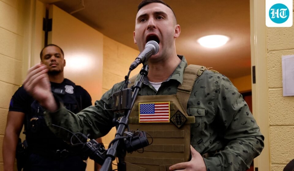 Far-right US activist Jake Lang addresses a meeting of the Dearborn City Council following an anti-Muslim demonstration he organized called the "Christian Crusade March" in Dearborn, Michigan, on August 18. (AFP)