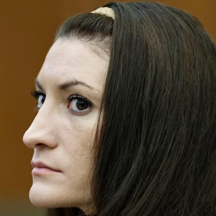 Defendant Lindsay Clancy watches the jury as Judge William Sullivan addresses them at the start of the day in court during the Lindsay Clancy murder trial in Plymouth Superior Court, Plymouth, Mass., on Tuesday, Aug. 25, 2026. (Greg Derr/The Patriot Ledger via AP, Pool) (Greg Derr/Pool The Patriot Ledge)