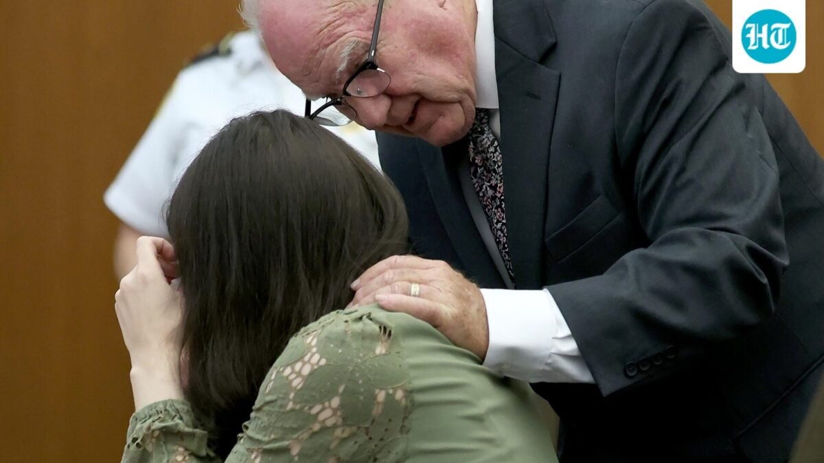 Defense attorney Kevin Reddington consoles his client, Lindsay Clancy, as she sobs during her murder trial at Plymouth Superior Court in Plymouth, Mass., Wednesday, Aug. 12, 2026. (Mark Stockwell/Boston Herald via AP, Pool) (Mark Stockwell/Pool The Boston H)