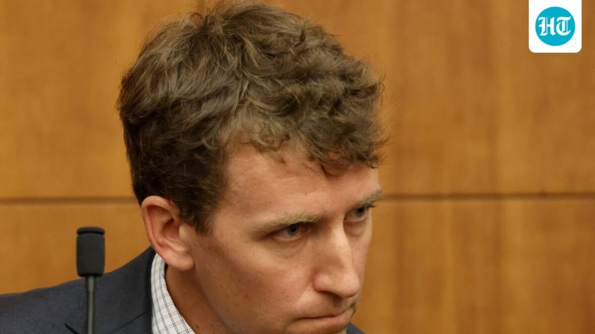 Patrick Clancy, the father of Cora, Dawson and Callan Clancy, looks on from the stand during Lindsay Clancy's murder trial. (REUTERS)