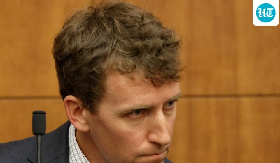 Patrick Clancy, the father of Cora, Dawson and Callan Clancy, looks on from the stand during Lindsay Clancy's murder trial. (REUTERS)