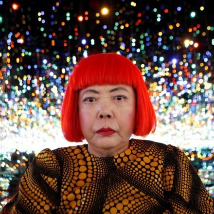 FILE PHOTO: Japanese artist Yayoi Kusama poses for a photograph inside her Infinity Mirrored Room installation titled "The Souls of Millions of Light Years Away" during a media preview of her new exhibition at the David Zwirner gallery in New York, U.S., November 7, 2013.  REUTERS/Mike Segar/File Photo     TPX IMAGES OF THE DAY (REUTERS)