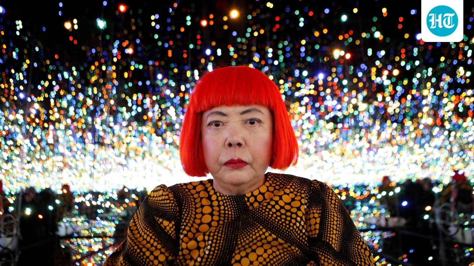 FILE PHOTO: Japanese artist Yayoi Kusama poses for a photograph inside her Infinity Mirrored Room installation titled "The Souls of Millions of Light Years Away" during a media preview of her new exhibition at the David Zwirner gallery in New York, U.S., November 7, 2013.  REUTERS/Mike Segar/File Photo     TPX IMAGES OF THE DAY (REUTERS)
