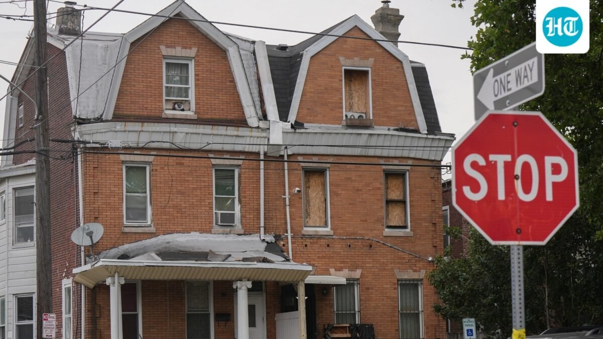Investigators search a home in the Olney section of Philadelphia, Friday, June 26, 2026. (Jessica Griffin/The Philadelphia Inquirer via AP) (Jessica Griffin/The Philadelphia)