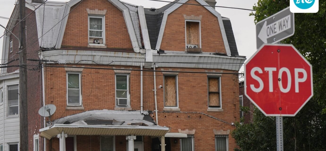 Investigators search a home in the Olney section of Philadelphia, Friday, June 26, 2026. (Jessica Griffin/The Philadelphia Inquirer via AP) (Jessica Griffin/The Philadelphia)