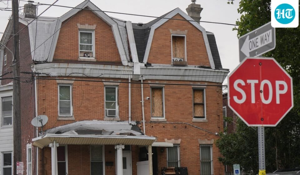 Investigators search a home in the Olney section of Philadelphia, Friday, June 26, 2026. (Jessica Griffin/The Philadelphia Inquirer via AP) (Jessica Griffin/The Philadelphia)