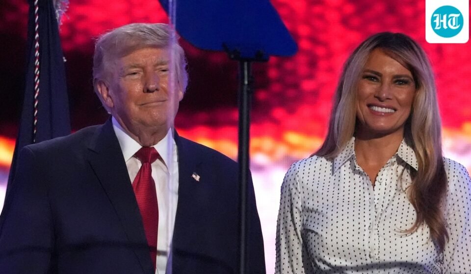 Trump and Melania on stage at the conclusion of his speech during Salute to America, an Independence Day event honoring the nation's 250th anniversary (July 4) (AP Photo/Mark Schiefelbein)