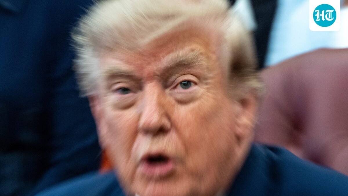 A zoom lens and slow shutter speed technique shows President Donald Trump speaking in the Oval Office of the White House, Monday, Aug. 3. (AP Photo/Alex Brandon)
