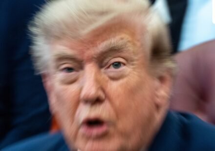 A zoom lens and slow shutter speed technique shows President Donald Trump speaking in the Oval Office of the White House, Monday, Aug. 3. (AP Photo/Alex Brandon)