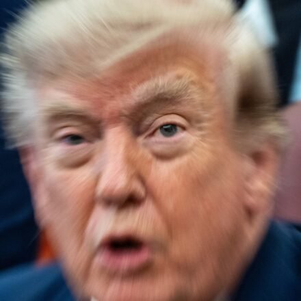 A zoom lens and slow shutter speed technique shows President Donald Trump speaking in the Oval Office of the White House, Monday, Aug. 3. (AP Photo/Alex Brandon)