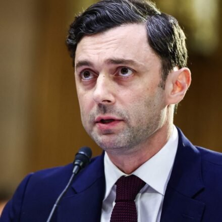 Senator Jon Ossoff criticized President Trump for focusing on personal travel with aide Natalie Harp instead of addressing vital issues like the conflict in Iran. (Getty Images via AFP)