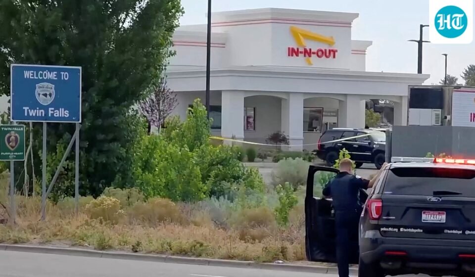 An emergency responder at the site of a fatal shooting incident in Twin Falls, Idaho August 1. (via REUTERS)