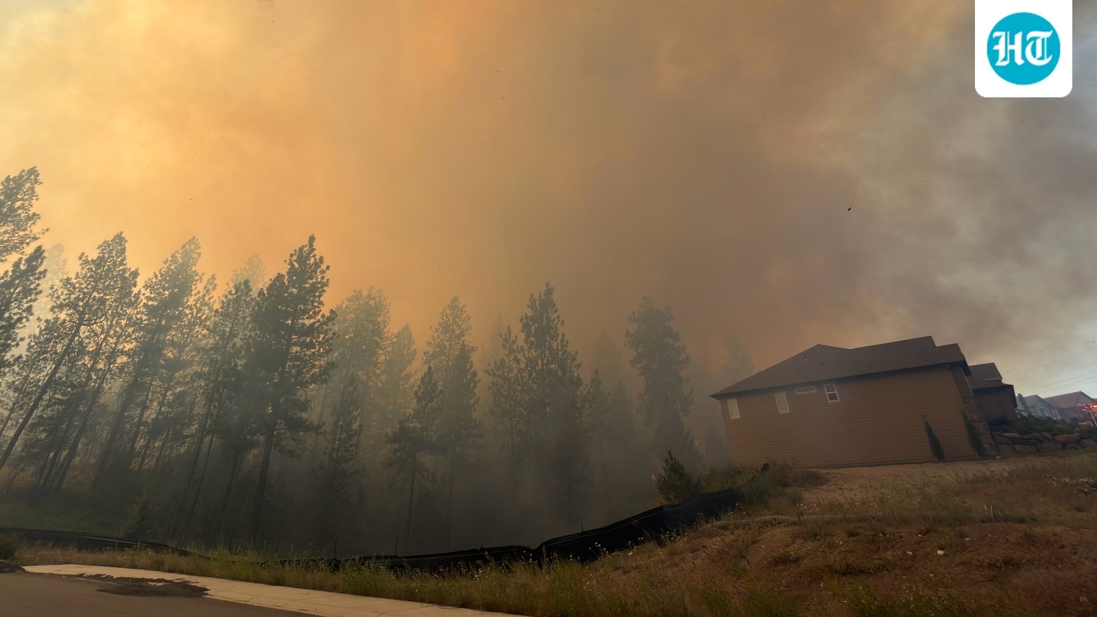 This photo provided by Spokane Fire District 9 shows the Upriver Fire burning northeast of Spokane, Wash., on Tuesday, June 16, 2026. (Robert Gray/Spokane Fire District 9 via AP) (Spokane Fire District 9 via AP)