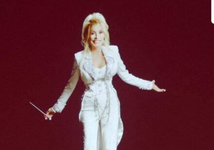Dolly Parton is seen onscreen during "Dolly Parton's Threads: My Songs In Symphony" Premiere at Schermerhorn Symphony Center on June 16. (Getty Images via AFP)