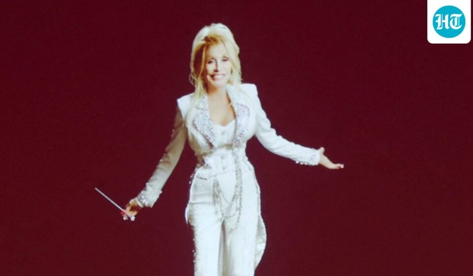 Dolly Parton is seen onscreen during "Dolly Parton's Threads: My Songs In Symphony" Premiere at Schermerhorn Symphony Center on June 16. (Getty Images via AFP)