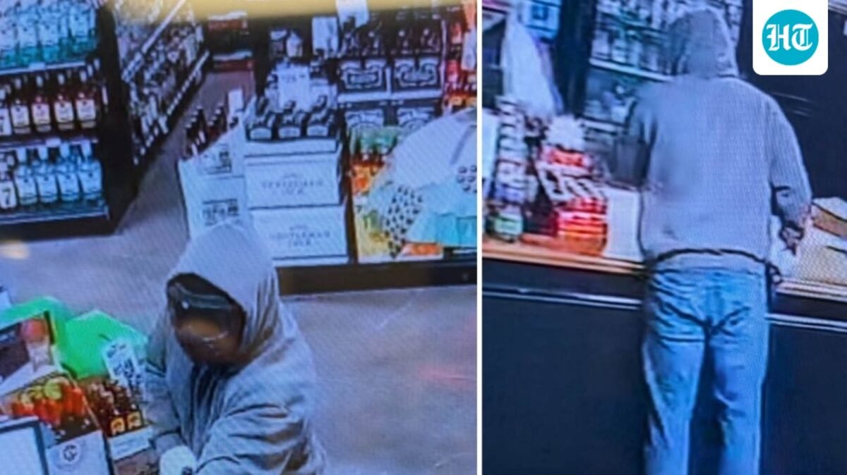 The masked suspect was seen on CCTV wearing a grey hoodie, jeans and black work-style boots (City of Jackson, TN - Police Department/Facebook)