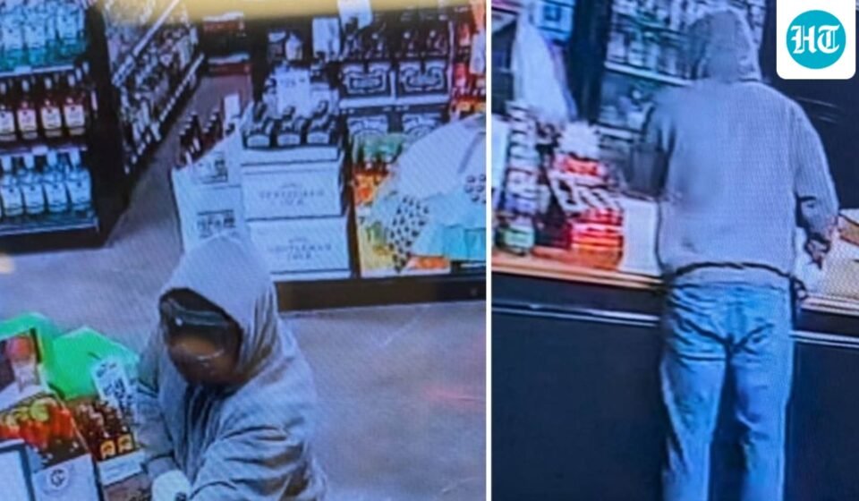 The masked suspect was seen on CCTV wearing a grey hoodie, jeans and black work-style boots (City of Jackson, TN - Police Department/Facebook)