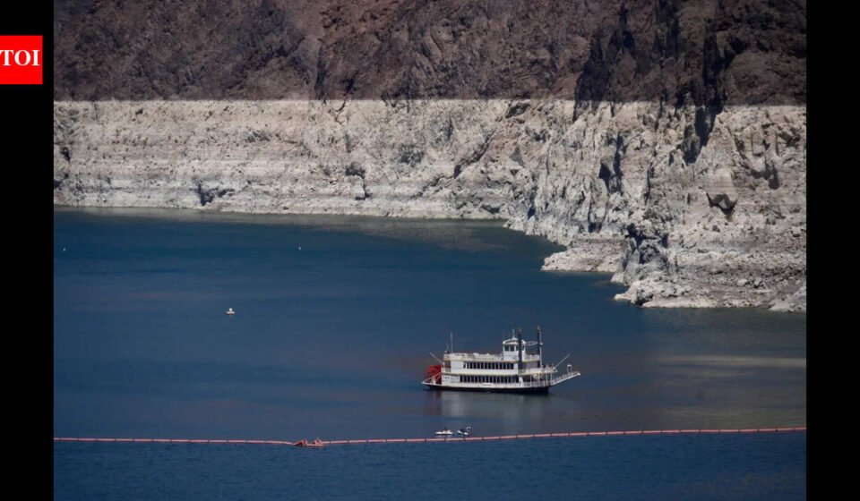 Lake Mead fell to 1,040.4 feet as the Colorado River crisis deepened; Lake Powell is also under pressure, raising questions over water and hydropower