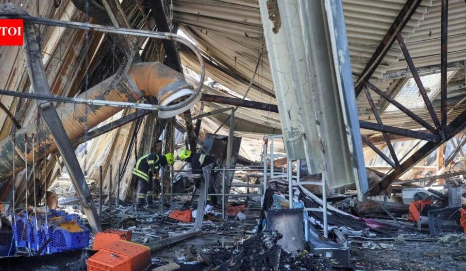 Ukraine Mall Strike: Rescuers Dig Through Wreckage As Zelensky Condemns 'Despicable' Attack