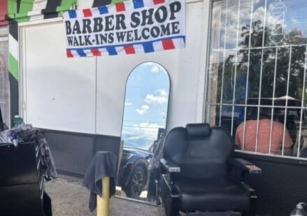 A San Antonio storm knocked out power and damaged homes; one barber simply moved his chair outside and kept cutting customers’ hair