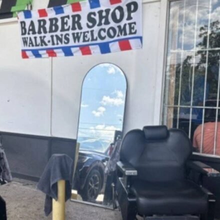A San Antonio storm knocked out power and damaged homes; one barber simply moved his chair outside and kept cutting customers’ hair