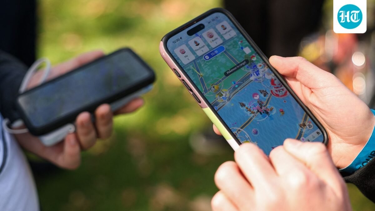 People play the Pokemon GO game on smartphones during the in-person Pokemon GO Tour. (AFP/ File Photo)